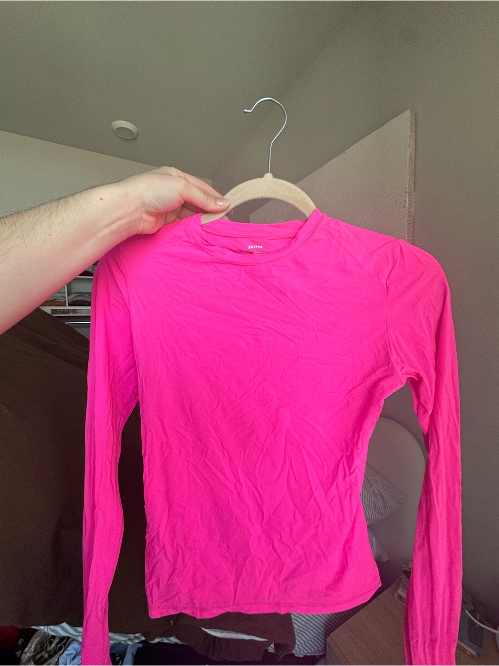 SKIMS Fits Everybody Long-Sleeve Top in Neon Pink - Picture 2 of 3